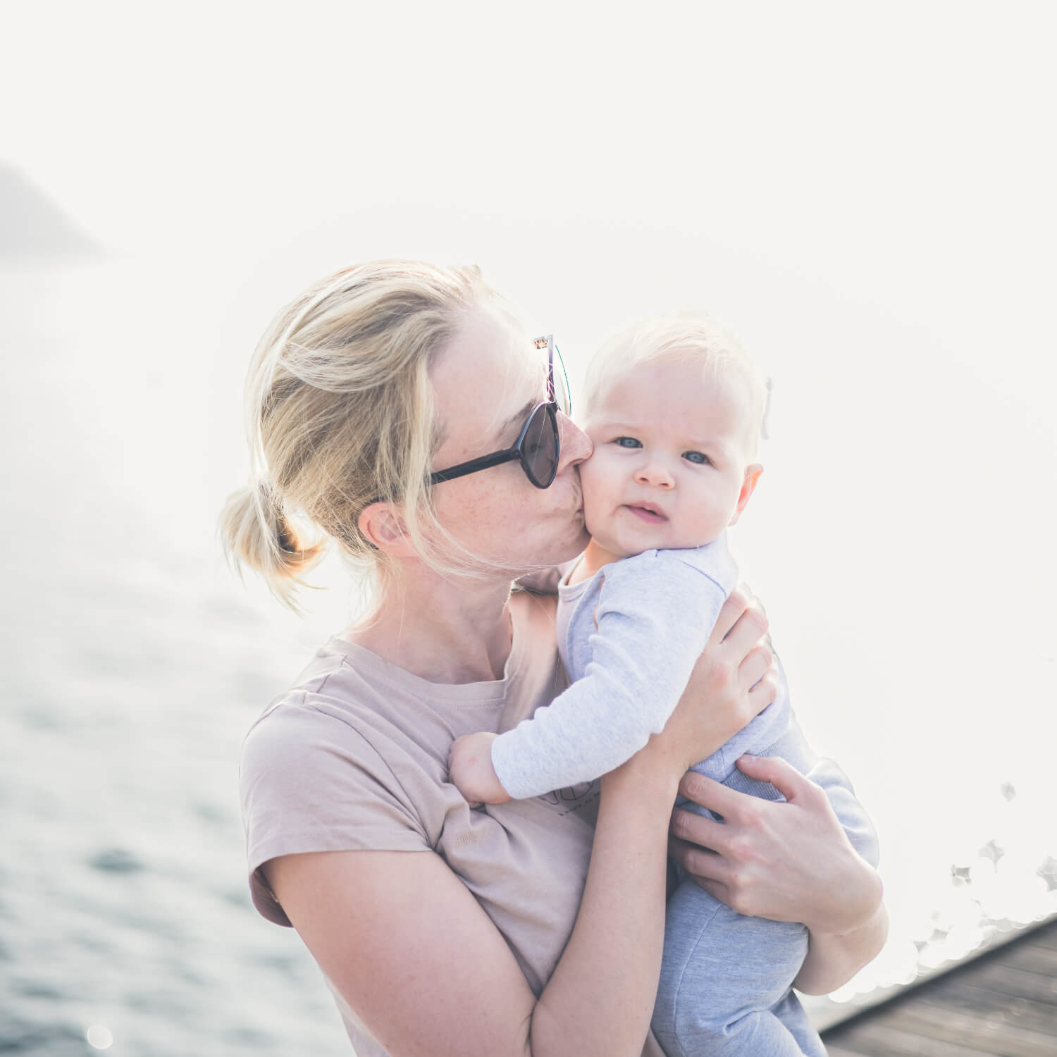 mom and baby together by the sea